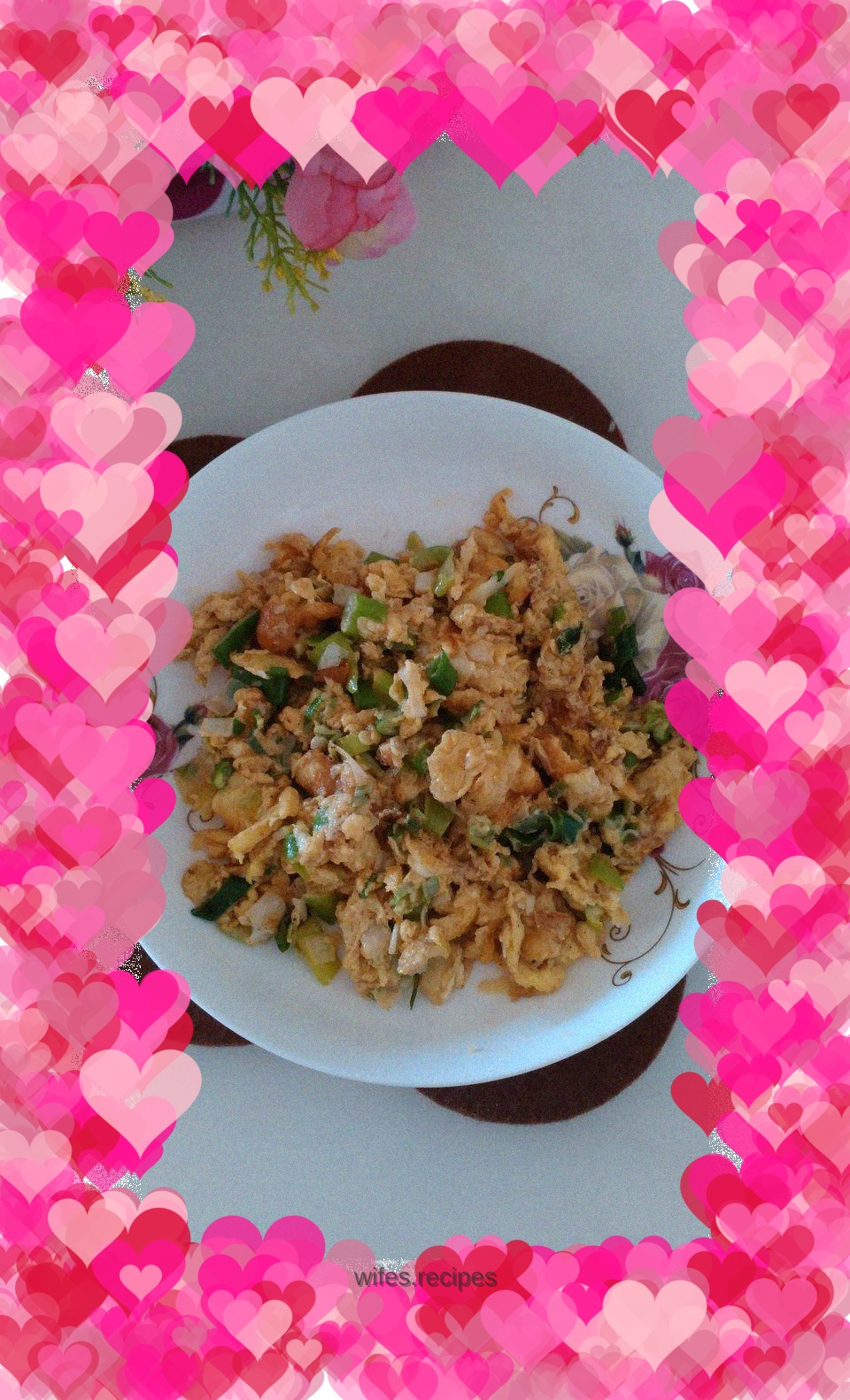 Fried eggs with chopped green onions