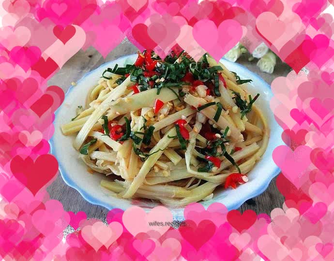 Chopped pepper and ginger leaves mixed with hand-shredded yellow bamboo shoots