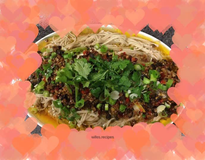 Steamed seabass with Sichuan flavored black bean sauce and enoki mushrooms