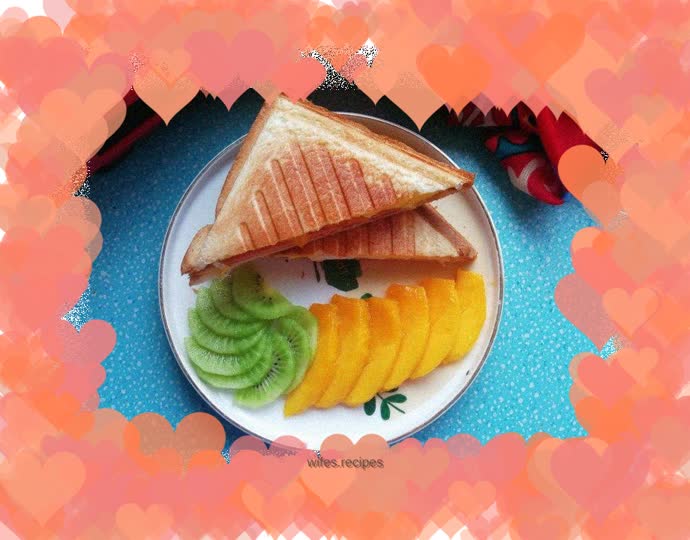 Mango, egg and ham sandwich