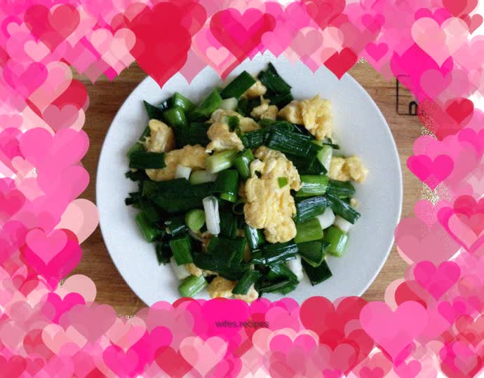 Fried eggs with garlic sprouts