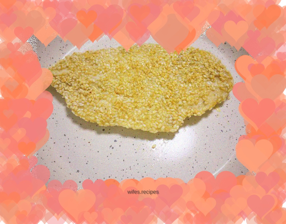 Pan-fried chicken breast with sesame seeds