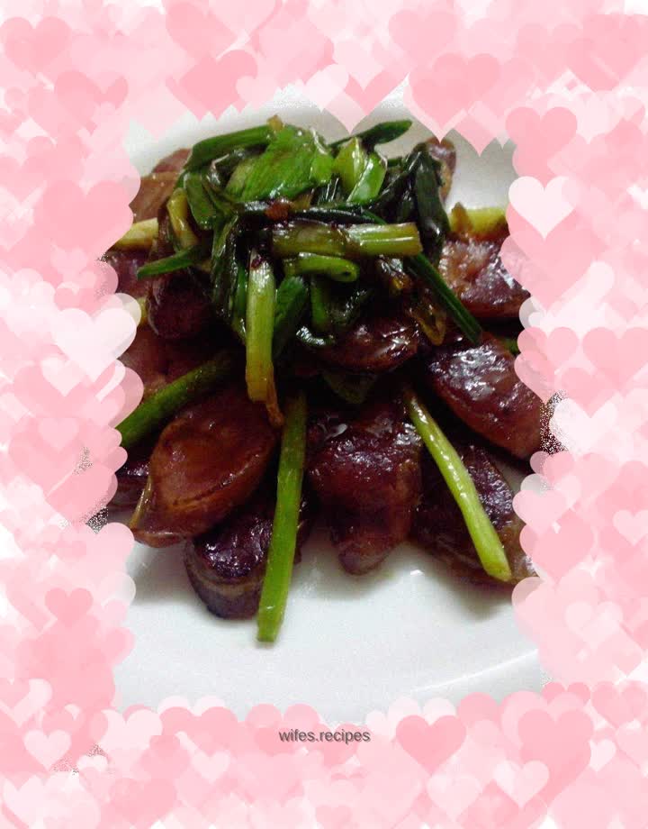 Stir-fried sausage with garlic sprouts