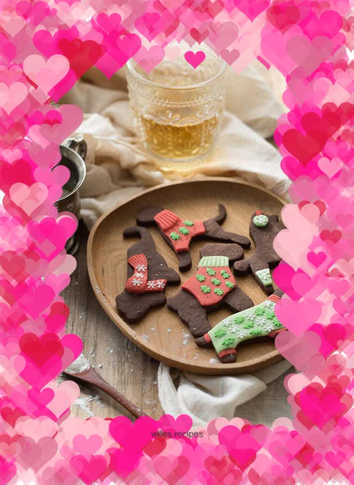 Christmas dog biscuits wearing sweaters