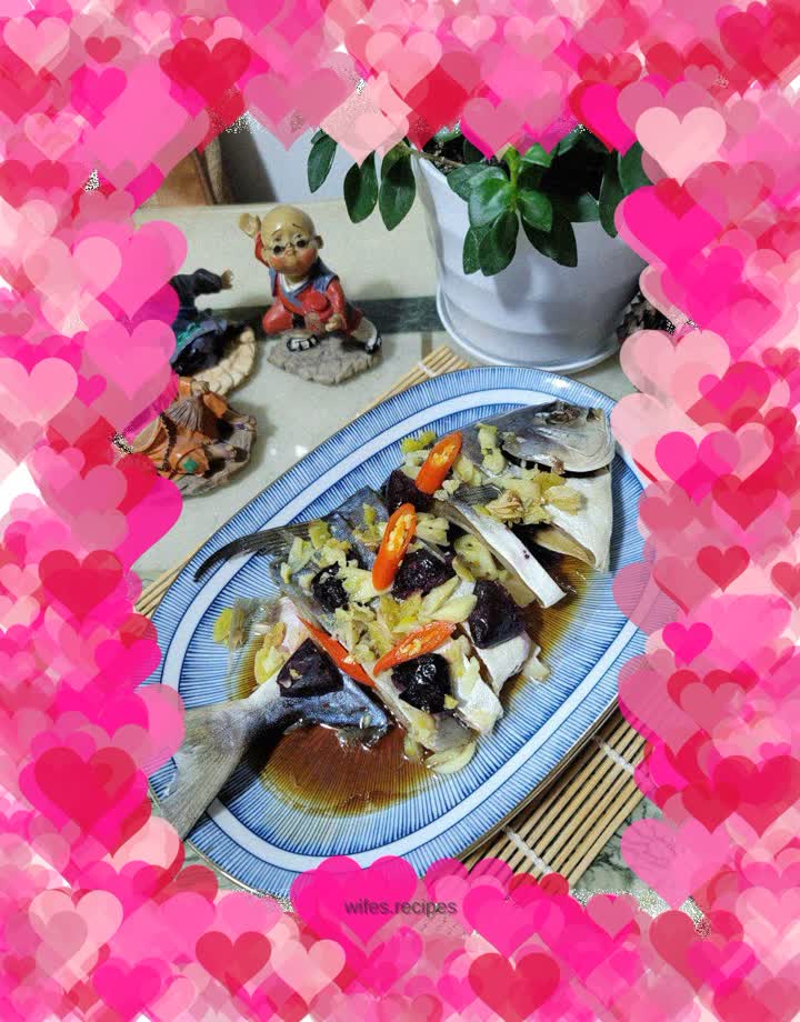 Steamed dried pomfret with olive wedges