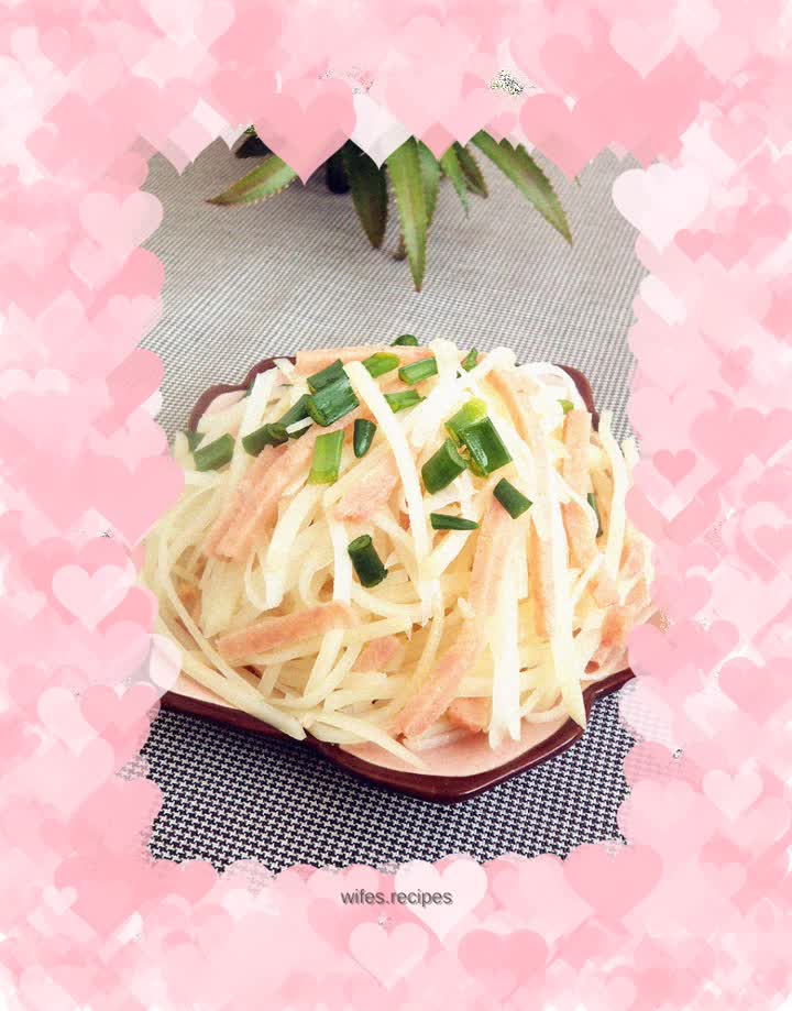 Shredded potatoes mixed with ham