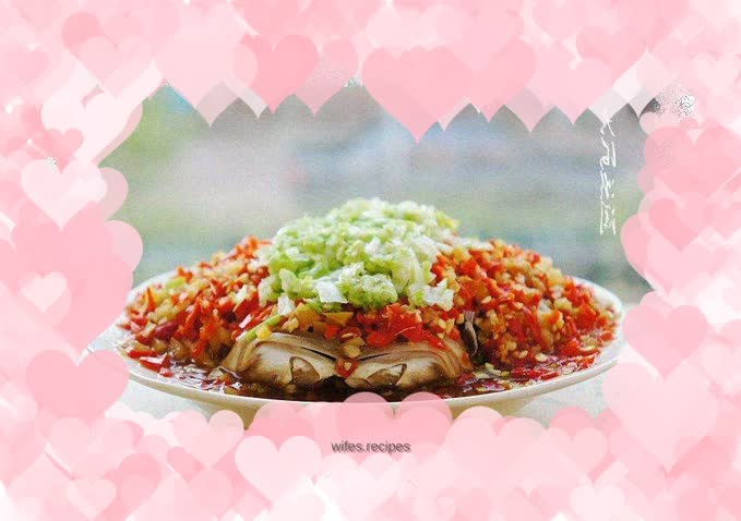 Silver carp head with chopped pepper