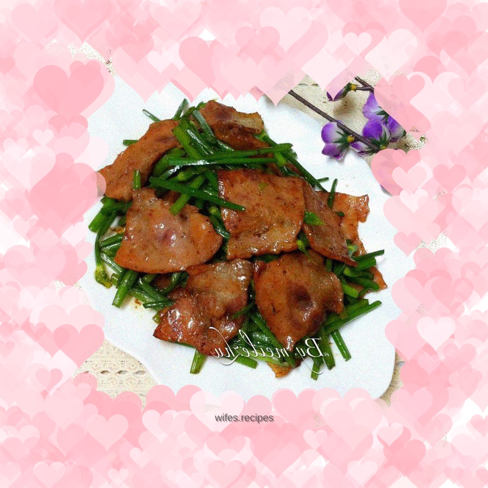 Stir-fried chive flowers with bacon