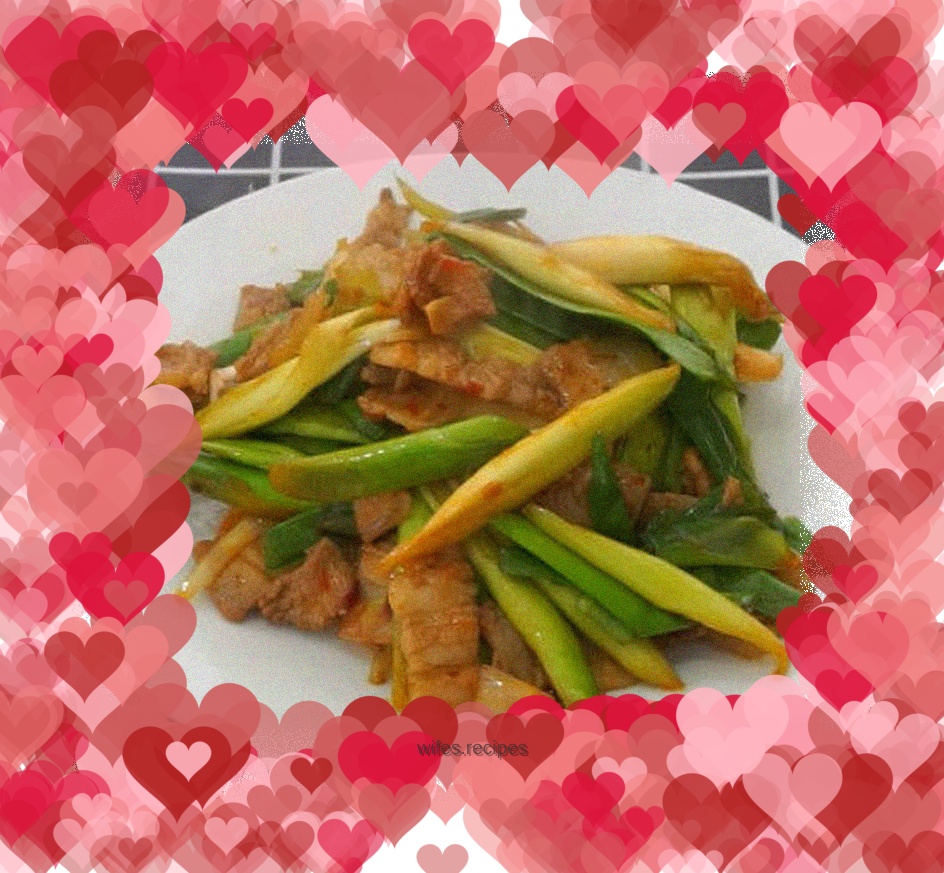 Stir-fried pork with garlic sprouts