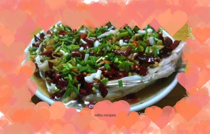 Fish head with chopped pepper and tofu