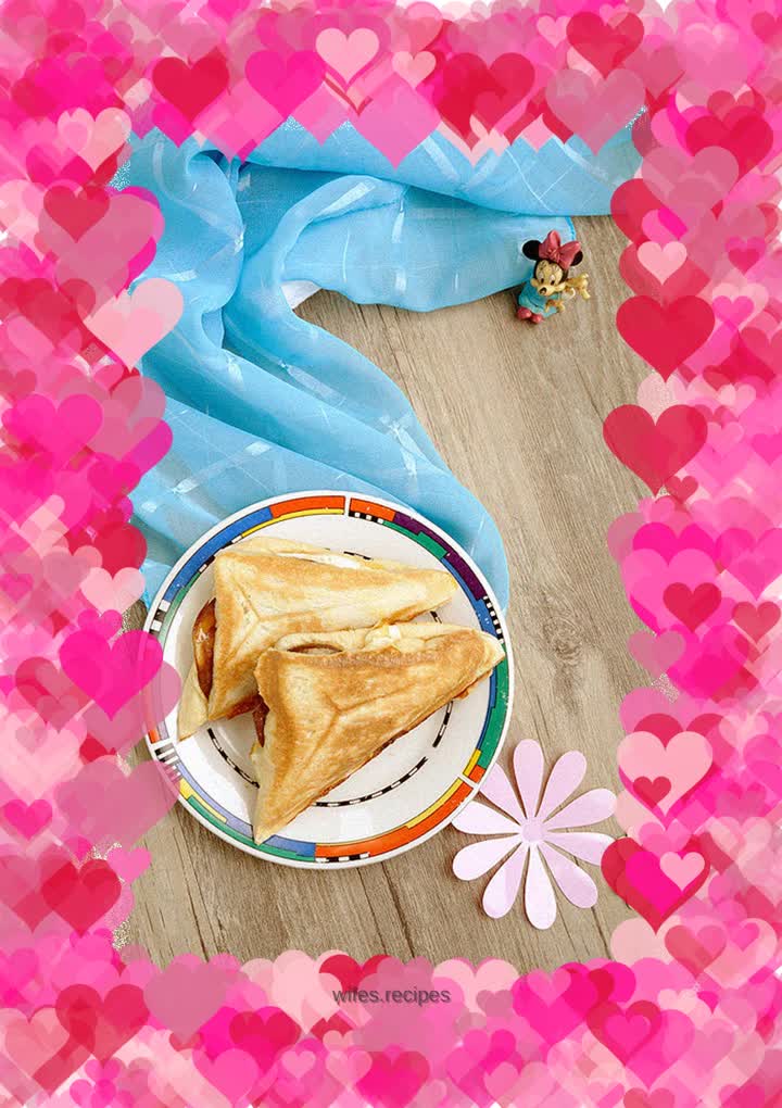 Sauce-flavored ham, egg and cheese sandwich