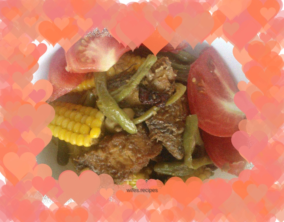 Stewed hairtail fish with potatoes, beans, corn