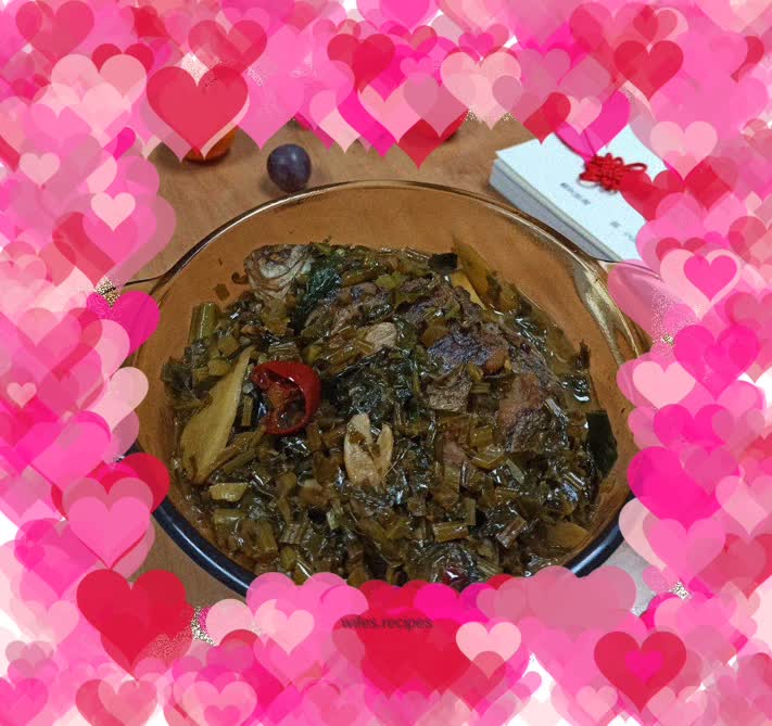 Braised crucian carp with pickled vegetables