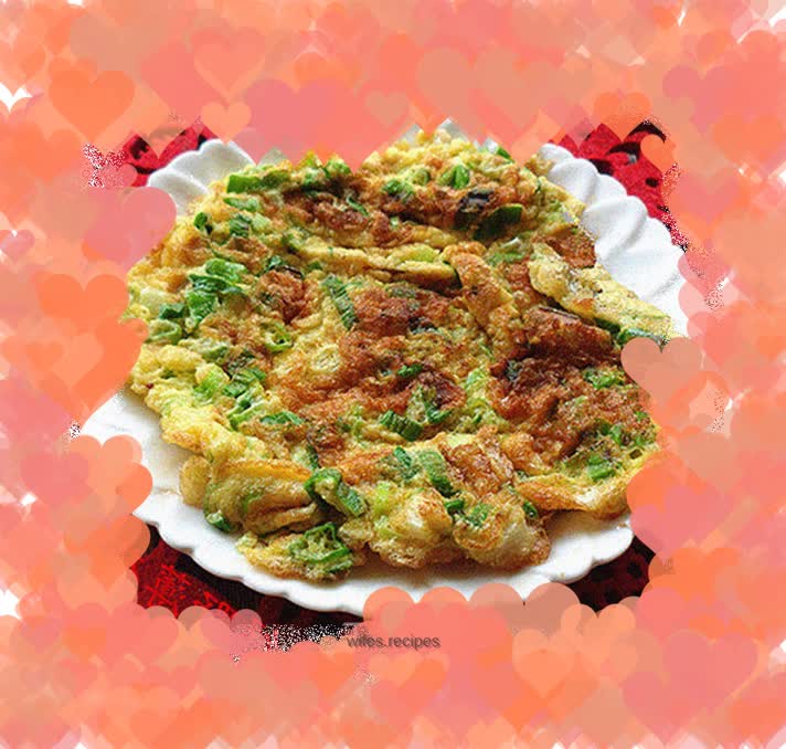 Fried eggs with green onions