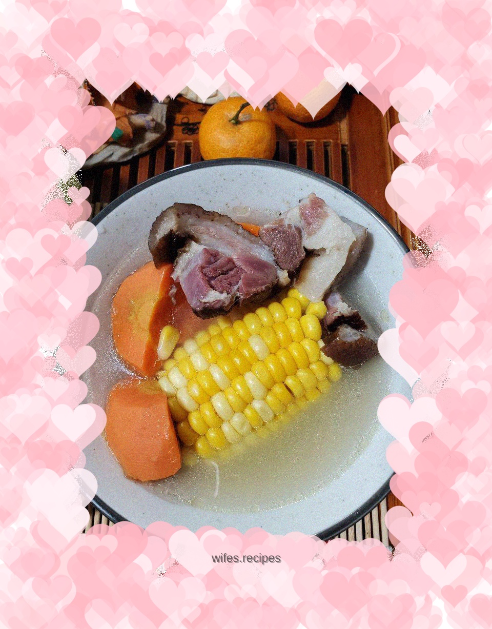 Braised pork trotters with corn, carrots