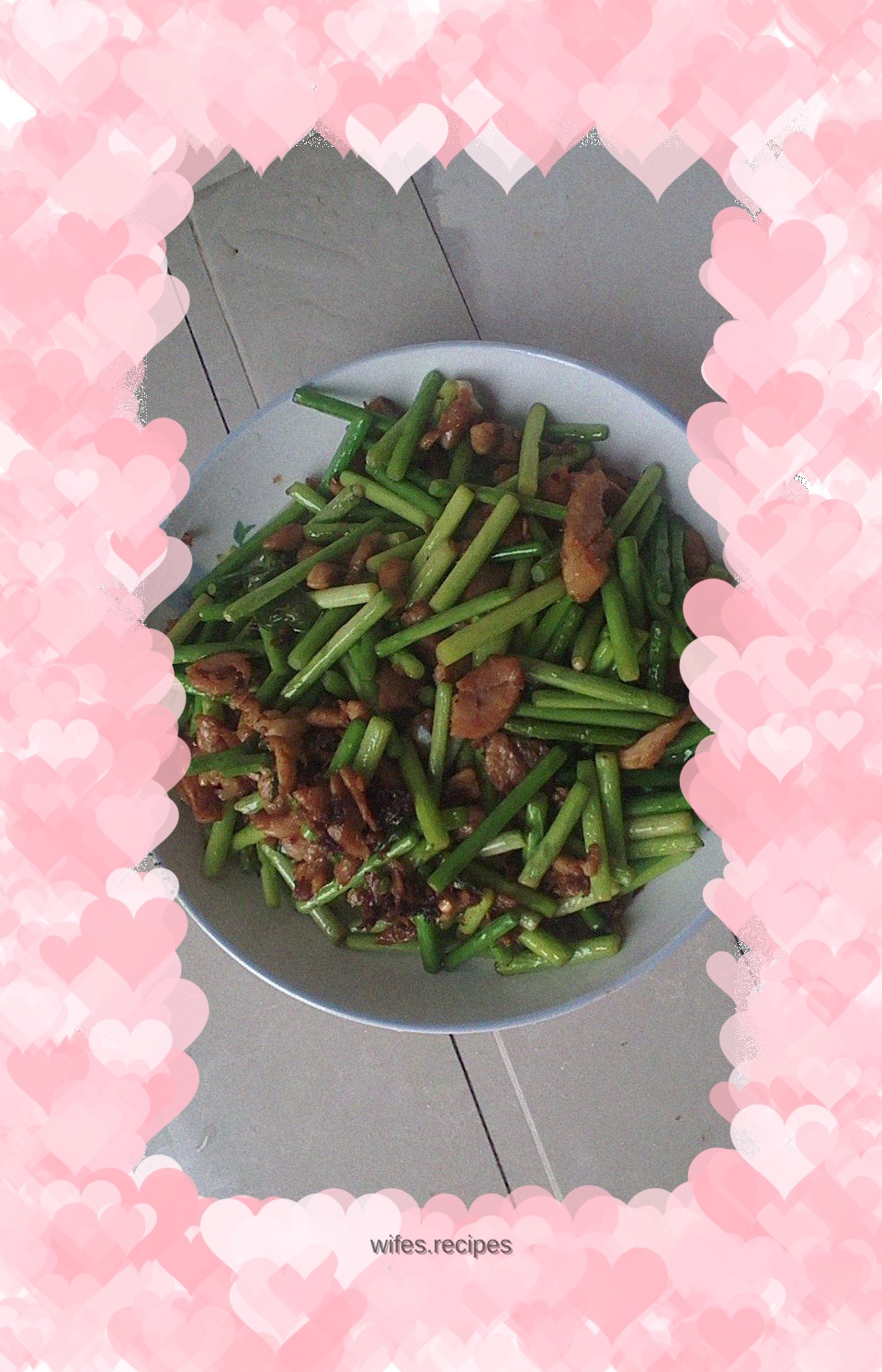 Stir-fried chicken shank with garlic sprouts