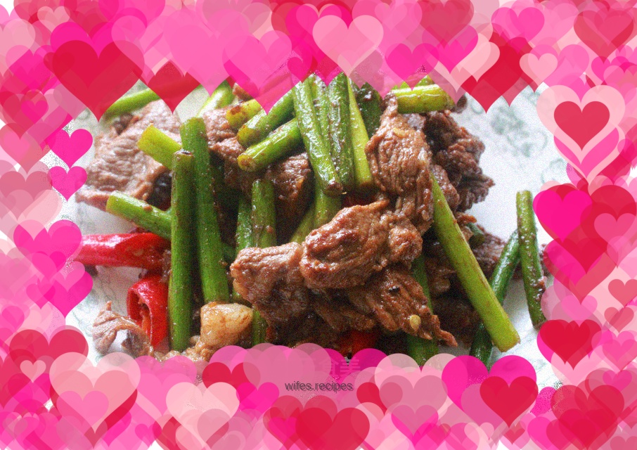 Stir-fried pork slices with garlic sprouts