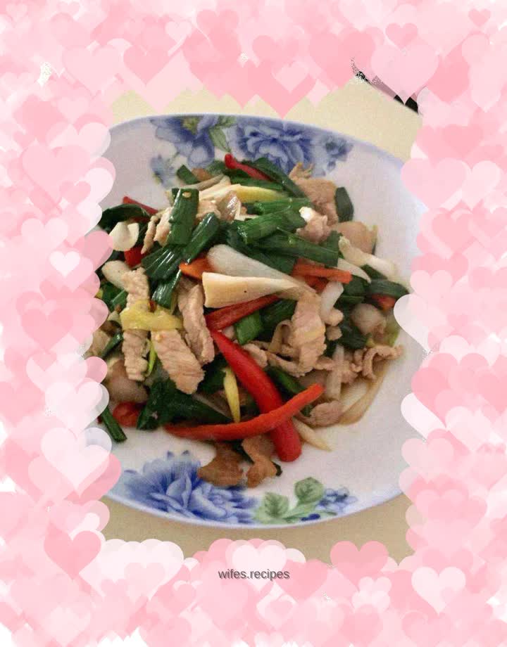 Stir-fried pork with garlic sprouts