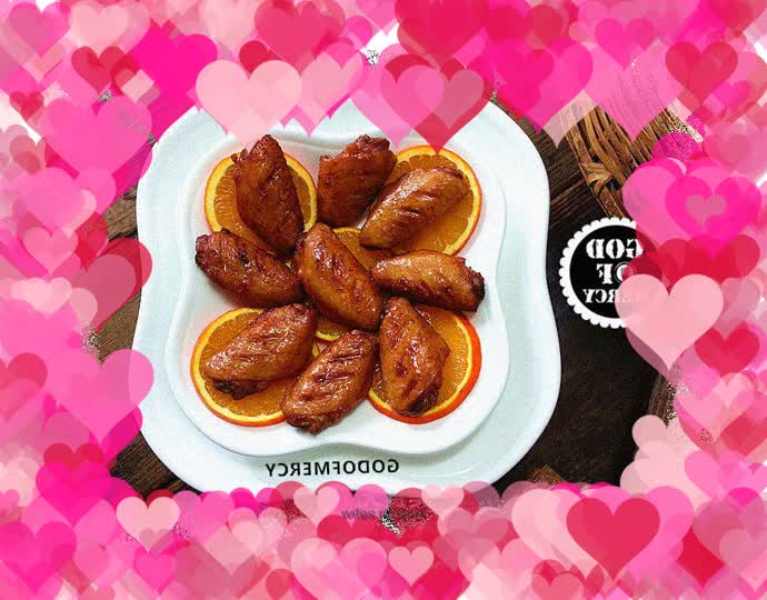 Delicious finger-licking orange grilled chicken wings