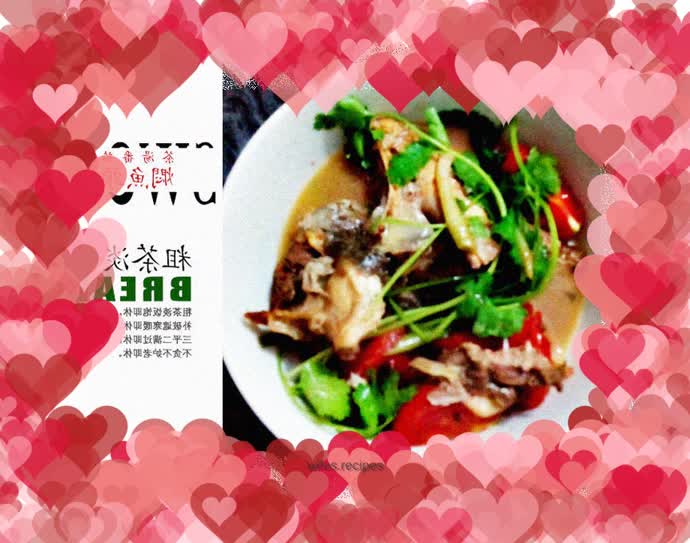 Braised fish head with tomatoes in tea soup