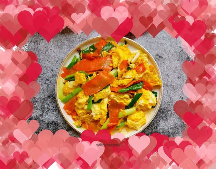 Scrambled eggs with carrots, garlic sprouts