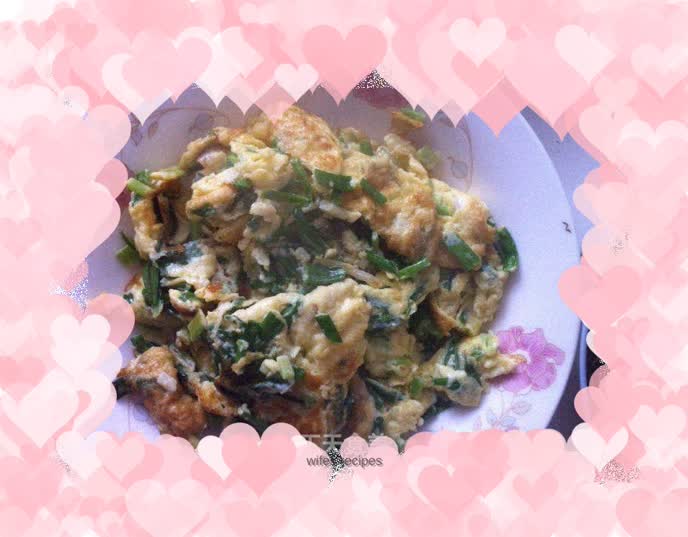 Fried eggs with green onions