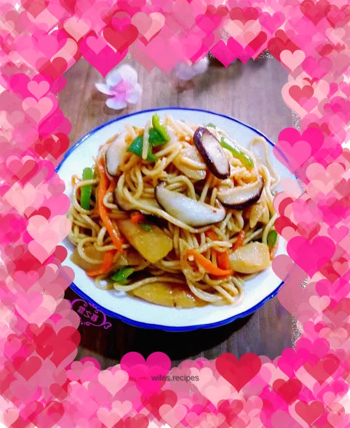 Fried noodles with mushrooms and ham sausage