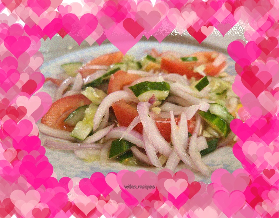 Cucumber mixed with tomatoes and onions