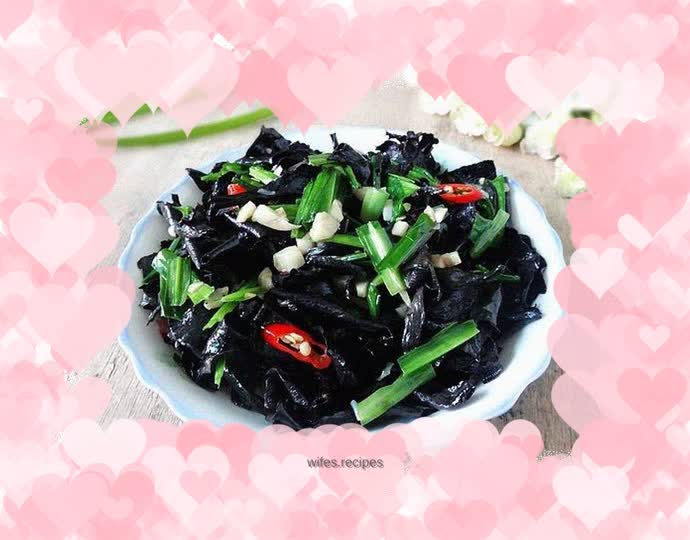 Stir-fried black trumpet mushrooms with kohlrabi leaves