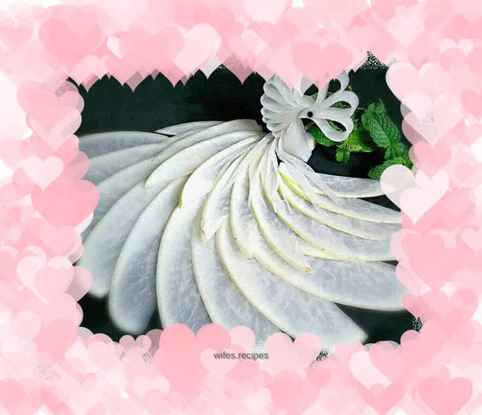 Peacock in full bloom and white radish