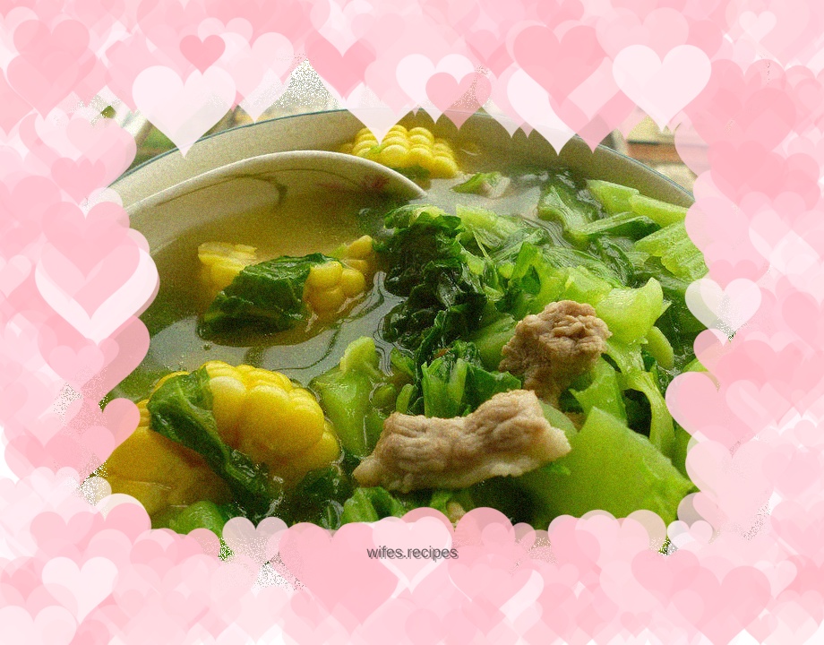 Mustard greens, corn and pork soup