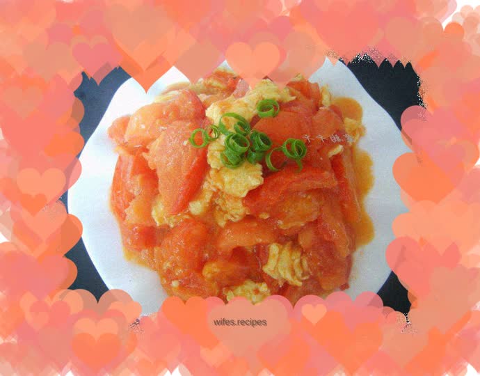 Home cooking - scrambled eggs with tomatoes