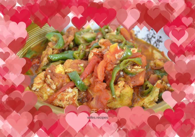 Scrambled eggs with tomatoes and green peppers