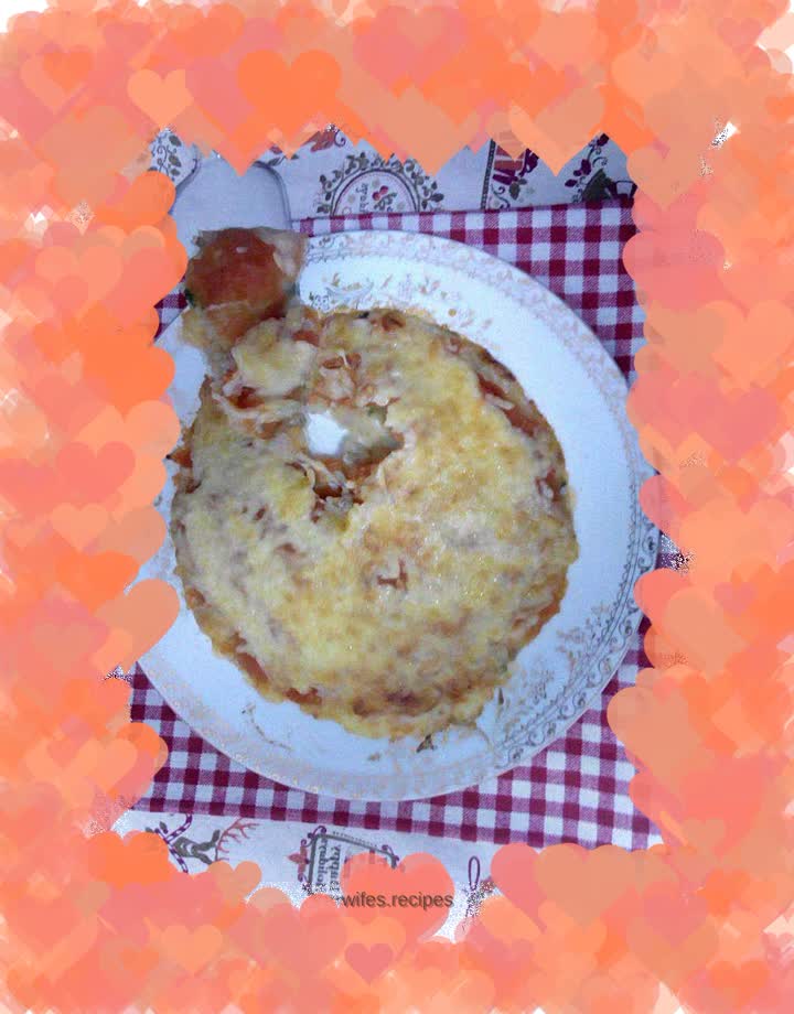 Baked mashed potatoes with minced meat and tomato sauce