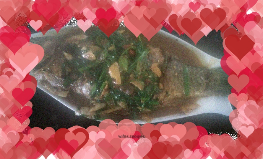 Braised crucian carp with leeks