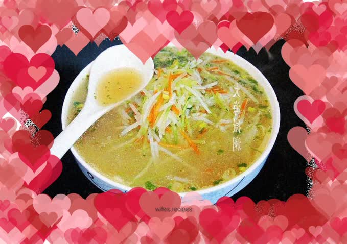 Carrot sticks and shredded potatoes soup