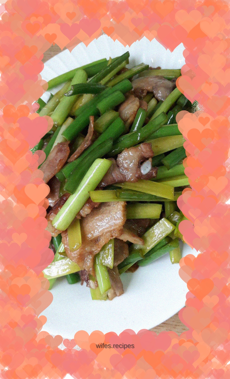 Stir-fried pork belly with garlic sprouts