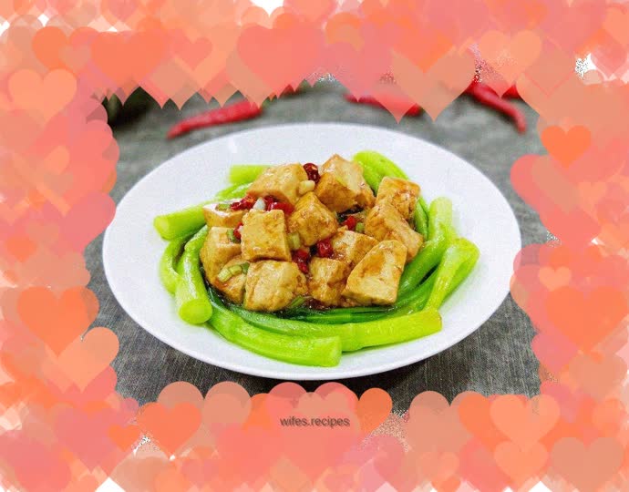 Tofu topped with vegetables