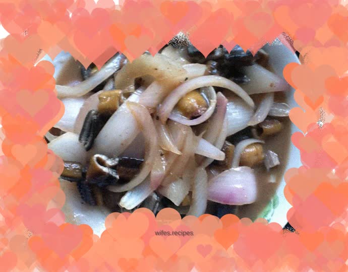 Classic home-cooked dish - fried eel slices with onions