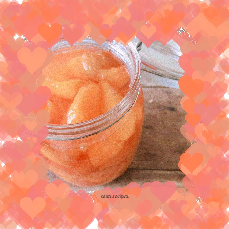 Homemade sweet canned yellow peaches