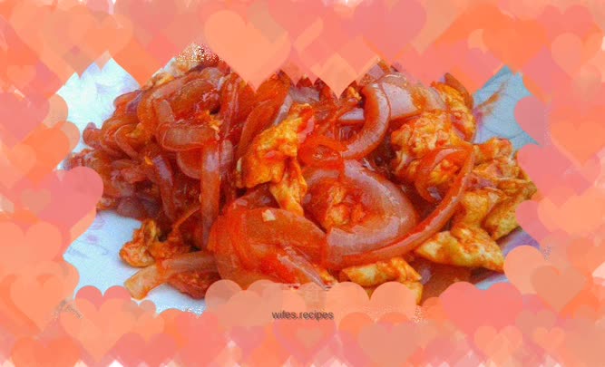 Fried onions and eggs in tomato sauce