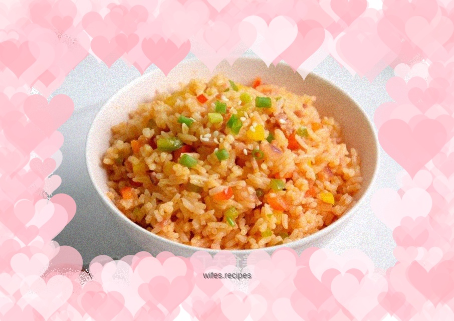Fried rice with colorful pepper and tomato sauce