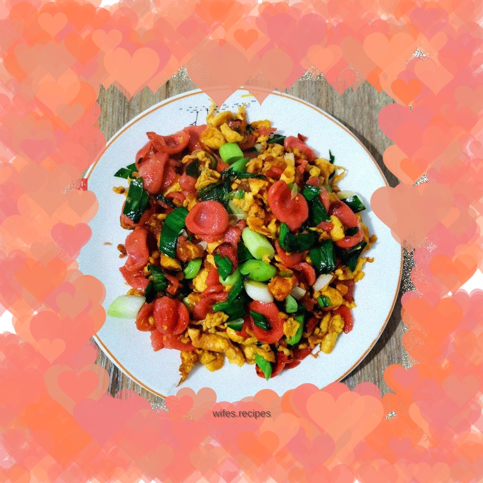 Hot dog sausage and scrambled eggs