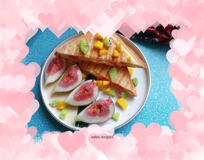 Tomato, ham, egg and cheese sandwich