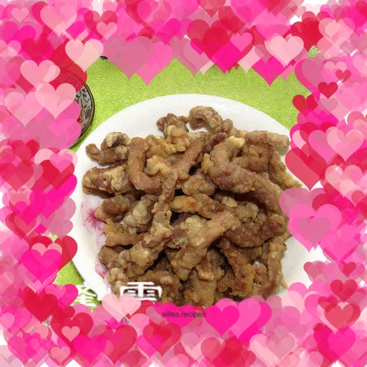 Dry fried pork strips that are crispy on the outside and tender on the inside