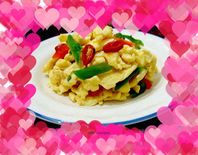 Fried eggs with green and red peppers