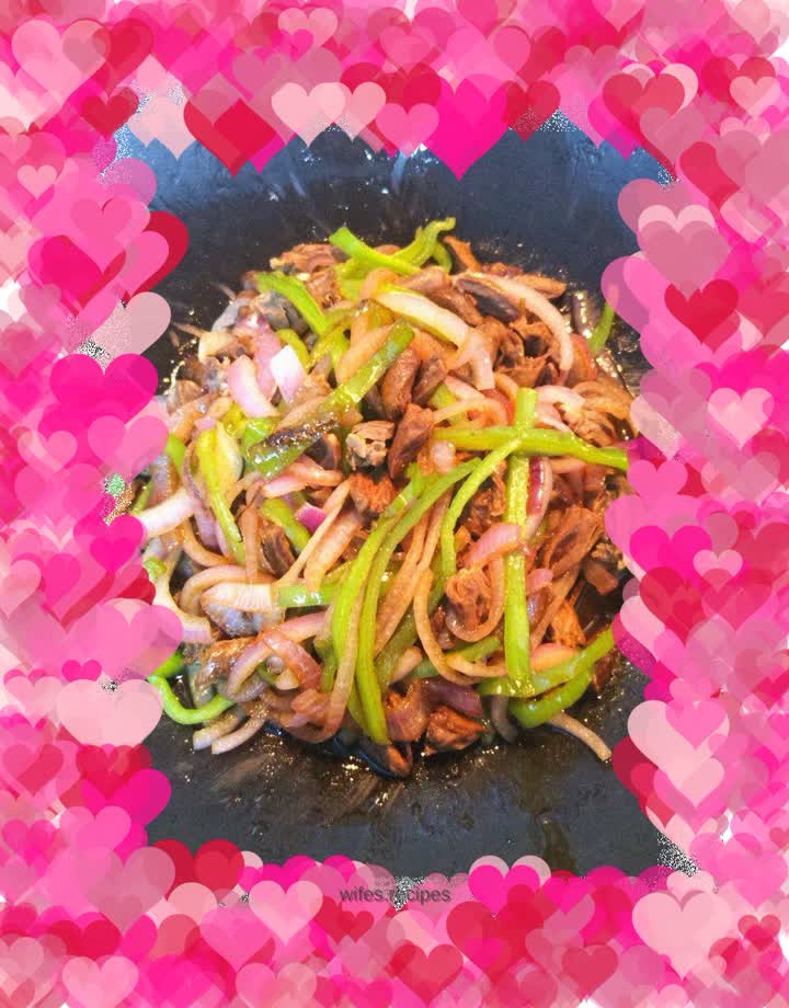 Fried chicken hearts with onions and green peppers