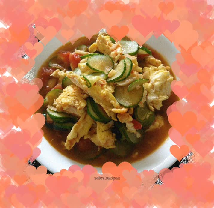 Scrambled eggs with tomatoes and cucumbers
