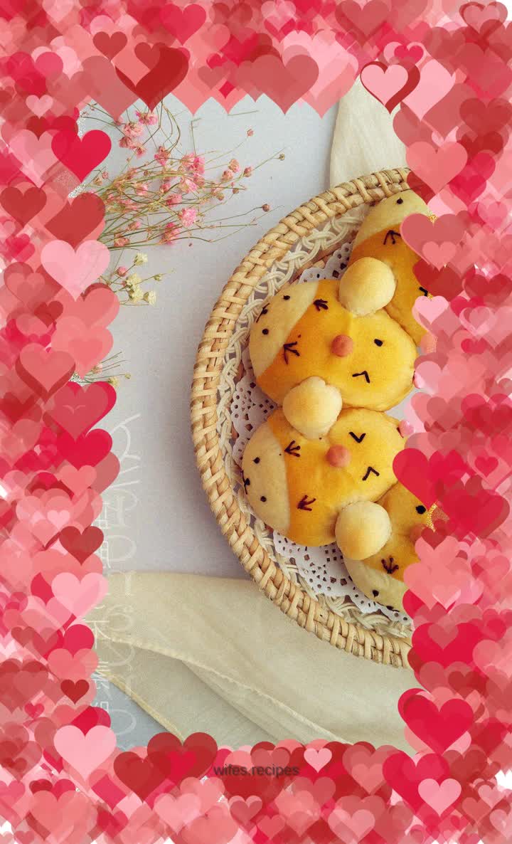 Baby bear disguised as a chicken squeezes bread