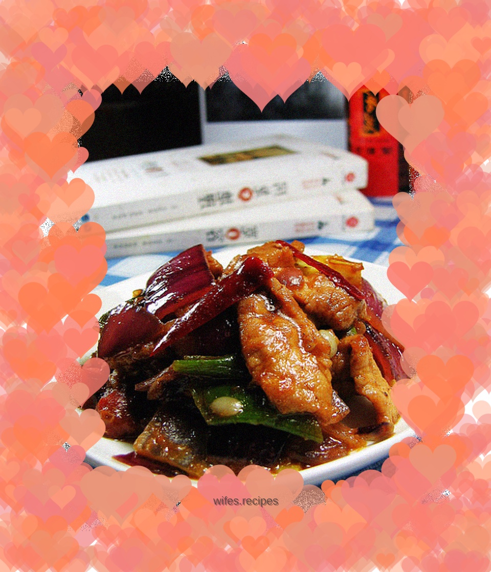 Fried meat with onions and tomatoes